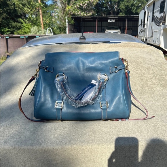 Brand New with the tags Dooney and Bourke